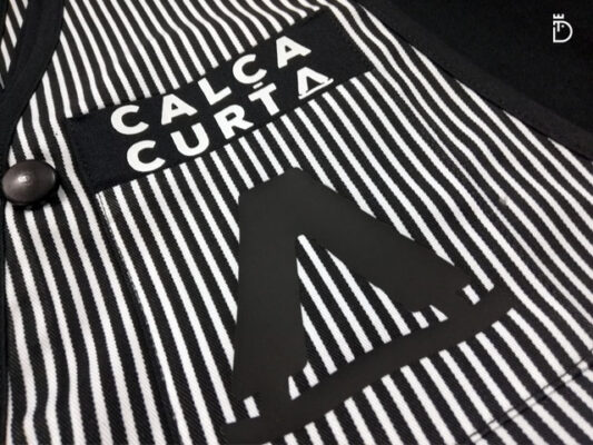 Pormenor do avental personalizado – Calça Curta